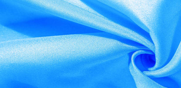 Texture, background, pattern, silk fabric in blue. This silk is 