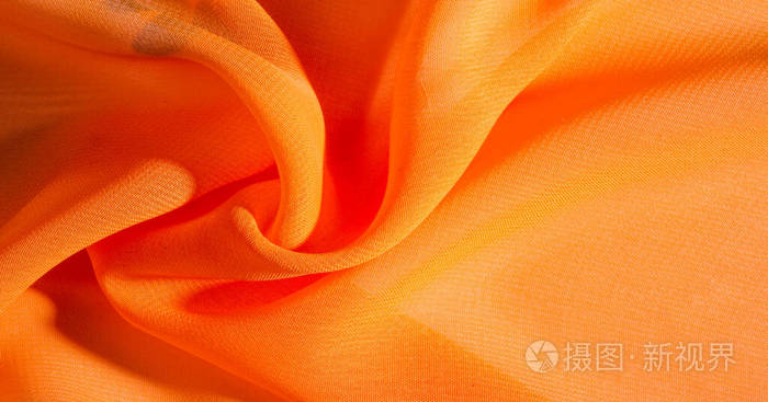 背景图案质感橘红色丝织物有着灿烂的色彩