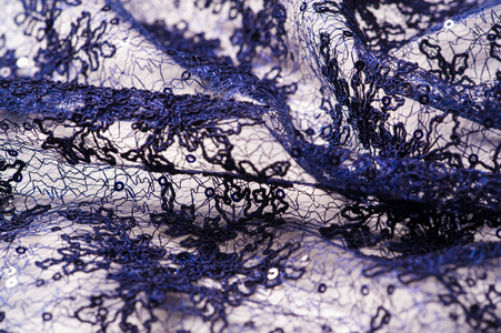 Texture, pattern, lace blue on a white background. Delicate and 