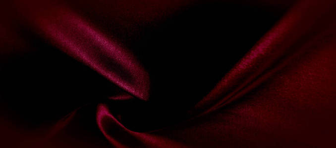 质感，红色丝织物全景照片。丝绸公爵情调绸缎