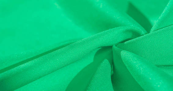 质感,绿色真丝面料,纯色浅绿色绸缎照片