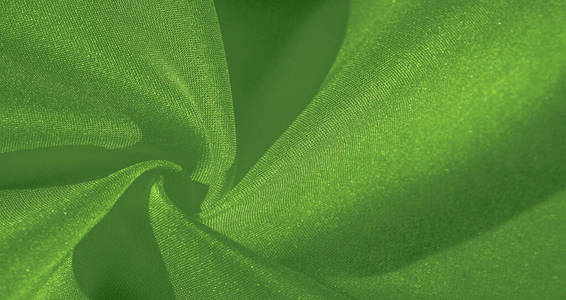 Texture, background, pattern, silk green fabric. Crepe satin on 