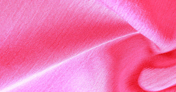 Background pattern texture wallpaper, crimson pink silk fabric. 