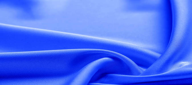 background texture, pattern. blue silk fabric.