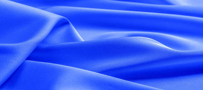 background texture, pattern. blue silk fabric. This lightweight 