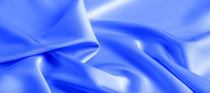 background texture, pattern. blue silk fabric.