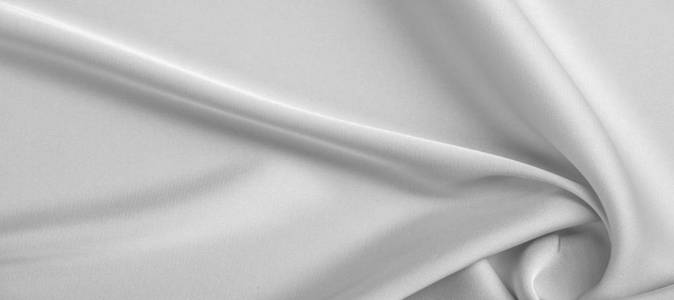 background texture, pattern. White silk fabric. It has a smooth 