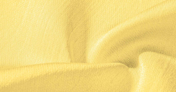 Background, pattern, texture, wallpaper, yellow silk fabric. It 