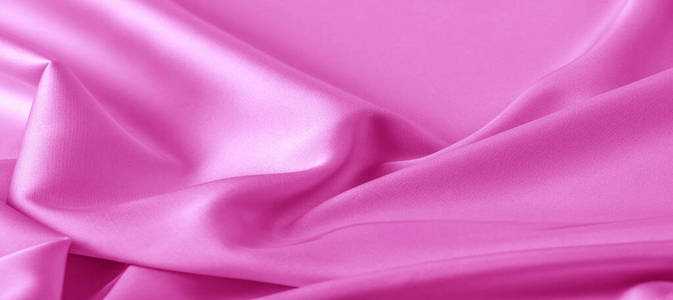  texture. Pink silk fabric. brilliant luster and characteristic 