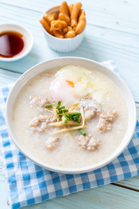 congee with minced pork in bowl 