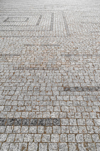 Stone pavement. Paved sidewalk paving stones made of stone. 