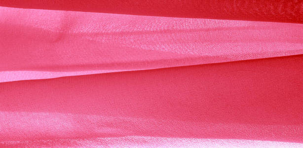 texture background pattern. Red silk fabric with a subtle matte 