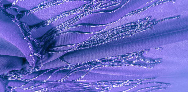 丝织物的背景纹理。这是一种天然的紫蓝色