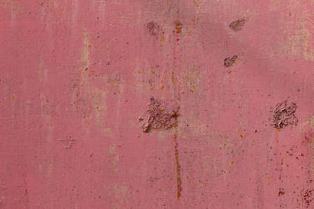 风化粗糙的粉红色金属墙面纹理图片
