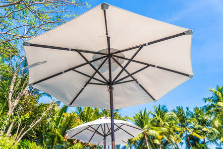 Beautiful landscape of sea ocean on sky with umbrella and chair 