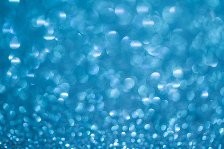 Blue Abstract Glitter Defocused Background with sparkle bokeh li