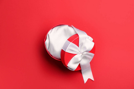 Empty gift box for Valentines Day on color background