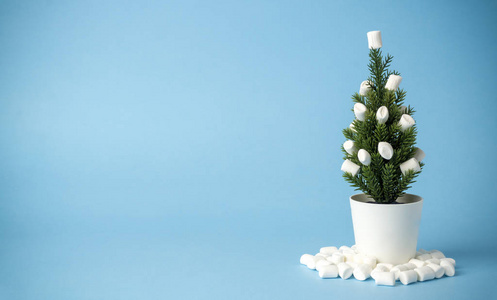 Christmas tree decorated with marshmallows instead of toys on a 