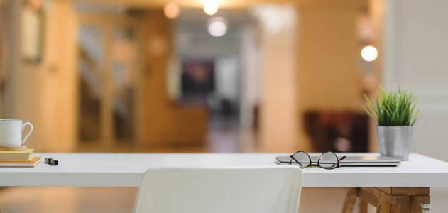 Modern  room with  supplies on white table with copy