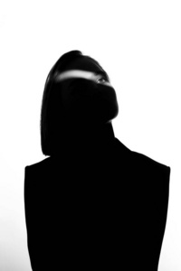 Fashionable beauty portrait. Black silhouette on white backgroun