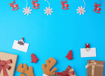  closed square gift boxes with bows on a blue background