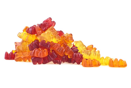 Heap of gummy bears candies isolated on white background. Jelly 