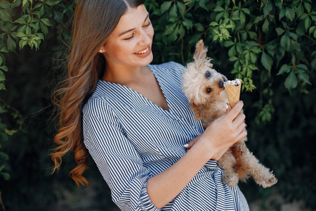 Elegant and stylish girl in a spring park