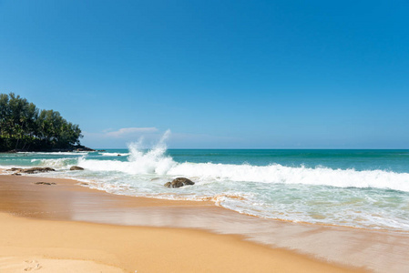 Beautiful wave on the beach, clear water, white sand 