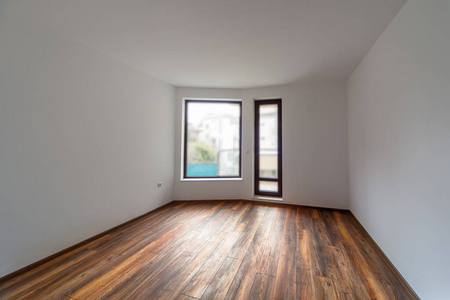 Empty room with natural light from windows.Modern house interior