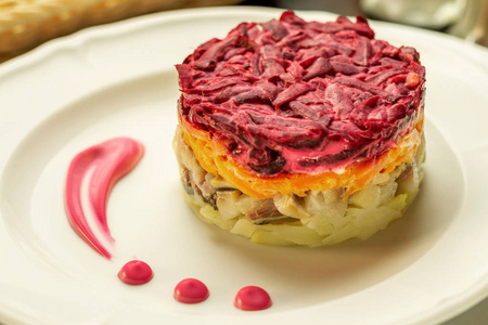 Fresh homemade salad of herring and vegetables potato, carrot, 