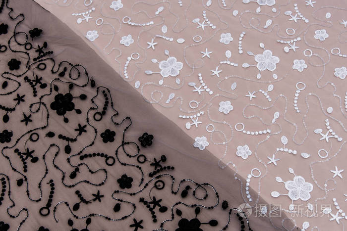 纹理蕾丝面料.白底花边工作室.纱或线制成的薄织物.