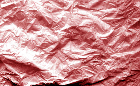 一张皱巴巴的红色模糊效果的纸。