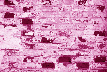 旧肮脏的砖墙纹理与模糊效果的粉红色色调。