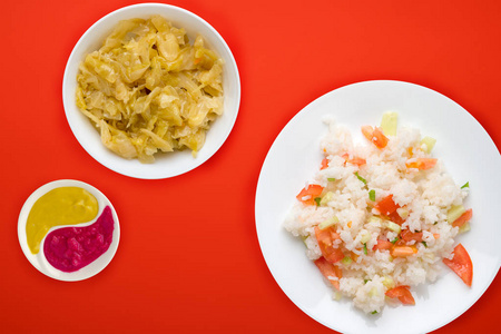  rice with vegetables on a white plate top view, white rice with