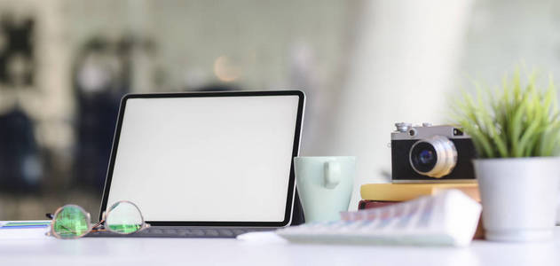 Closeup view of comfortable designer workspace with blank scree