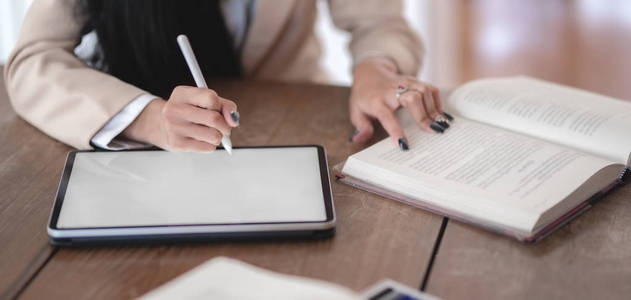 Closeup view of professional businesswoman working on her curre