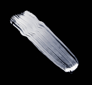 Silver paint brush stroke texture isolated on black background, 