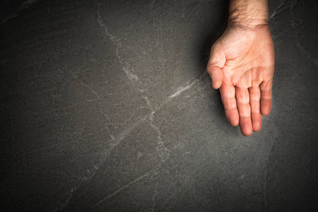 elder male hand keeping empty cupped palm 