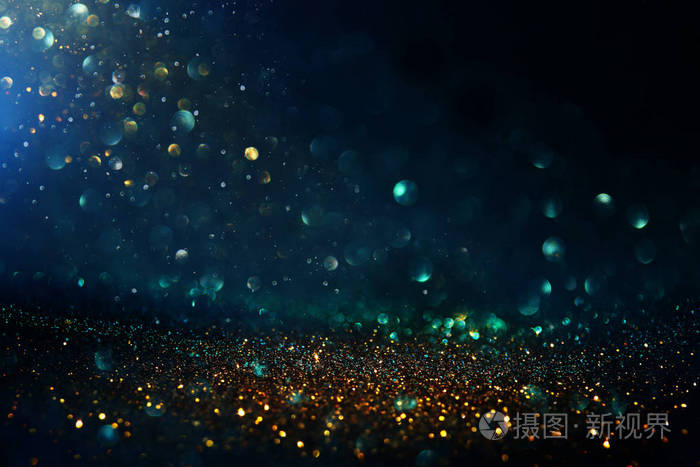 抽象闪烁的银色和蓝色灯光背景去聚焦