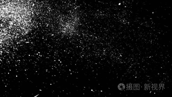 抽象的白色尘埃颗粒漂浮在黑色背景上单色动画抽象雪的白色动态运动