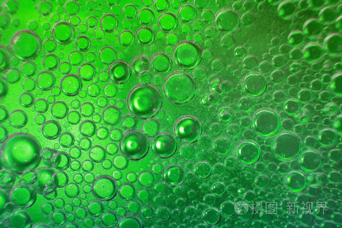 抽象的绿色背景和油圈 水泡靠近了 水中的油泡 圆形气泡背景照片 正版商用图片2672o1 摄图新视界