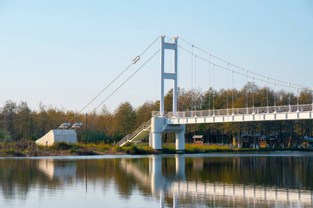 Beautiful view of gold lake and white iron bridge in Maltakva 