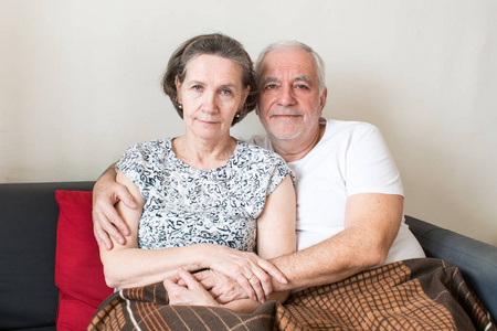 happy old couple senior sit on couch enjoy life healthy 