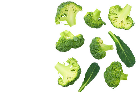 green broccoli with slices and leaves isolated on white backgrou