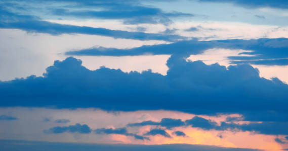 clouds in the blue sky. a visible mass of condensed water vapor 