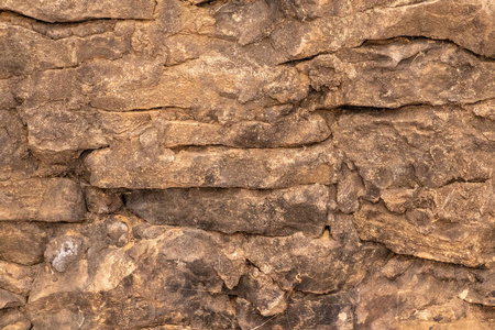 水俄古墙石的抽象背景纹理图片