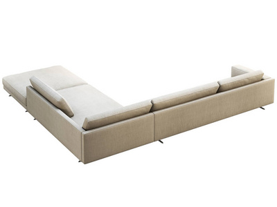 现代灰色织物角落沙发，带枕头和针织格纹。三维渲染