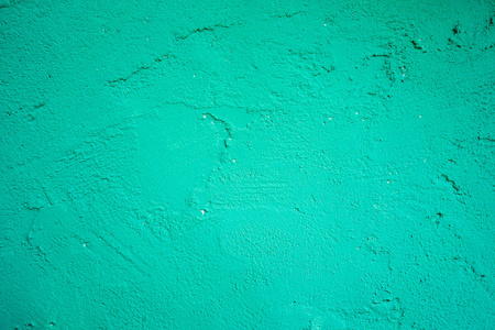绿色油漆石墙背景。