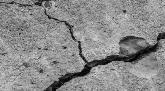 抽象水泥背景.裂缝混凝土纹理特写.照片