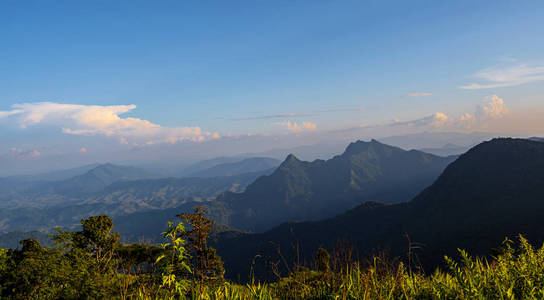 High angle viewpoint sunset over mountains and forest 